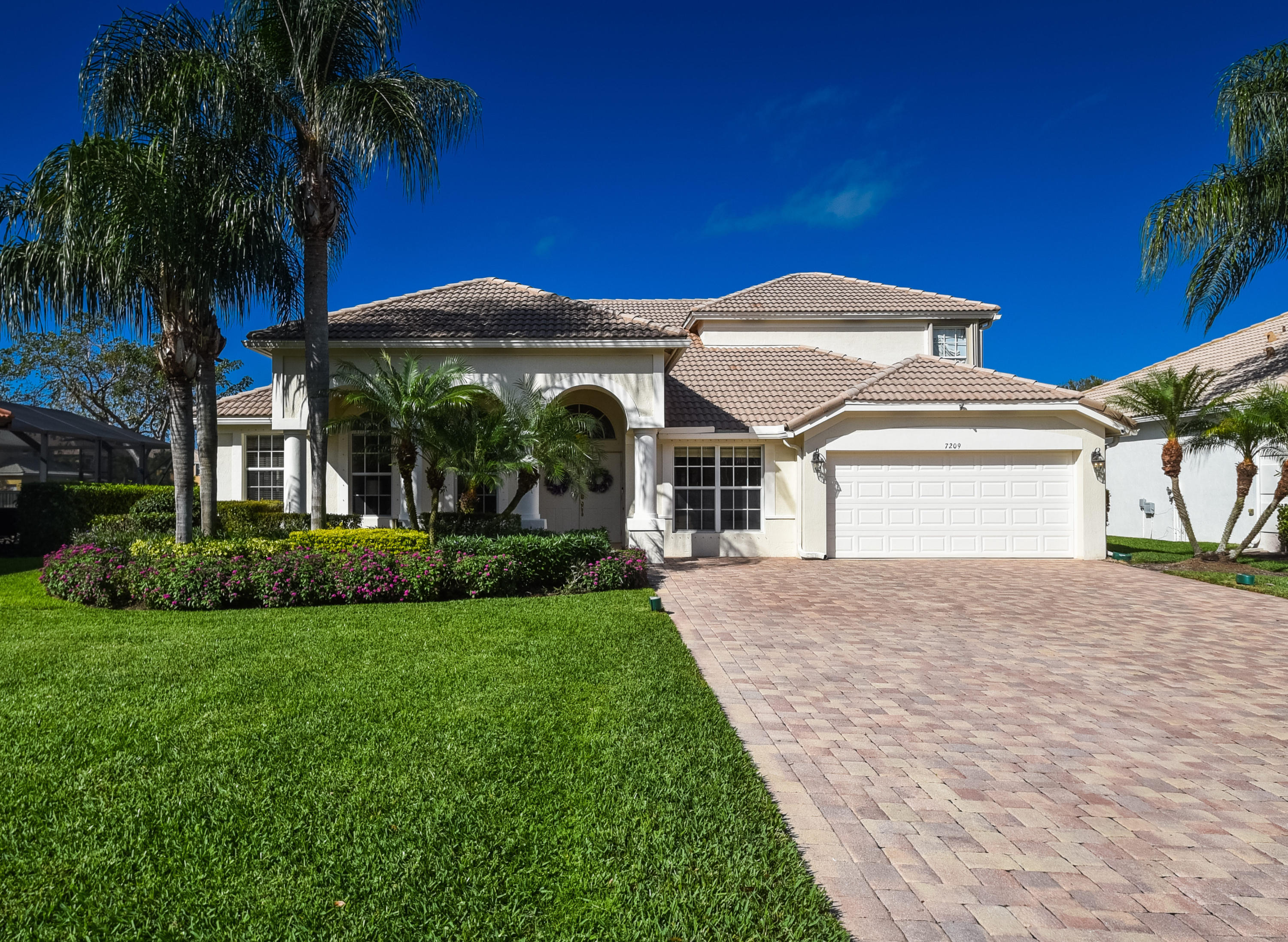 7209 Serrano Terrace Delray Beach, FL 33446 - Photo 12 of 46 Front large driveway