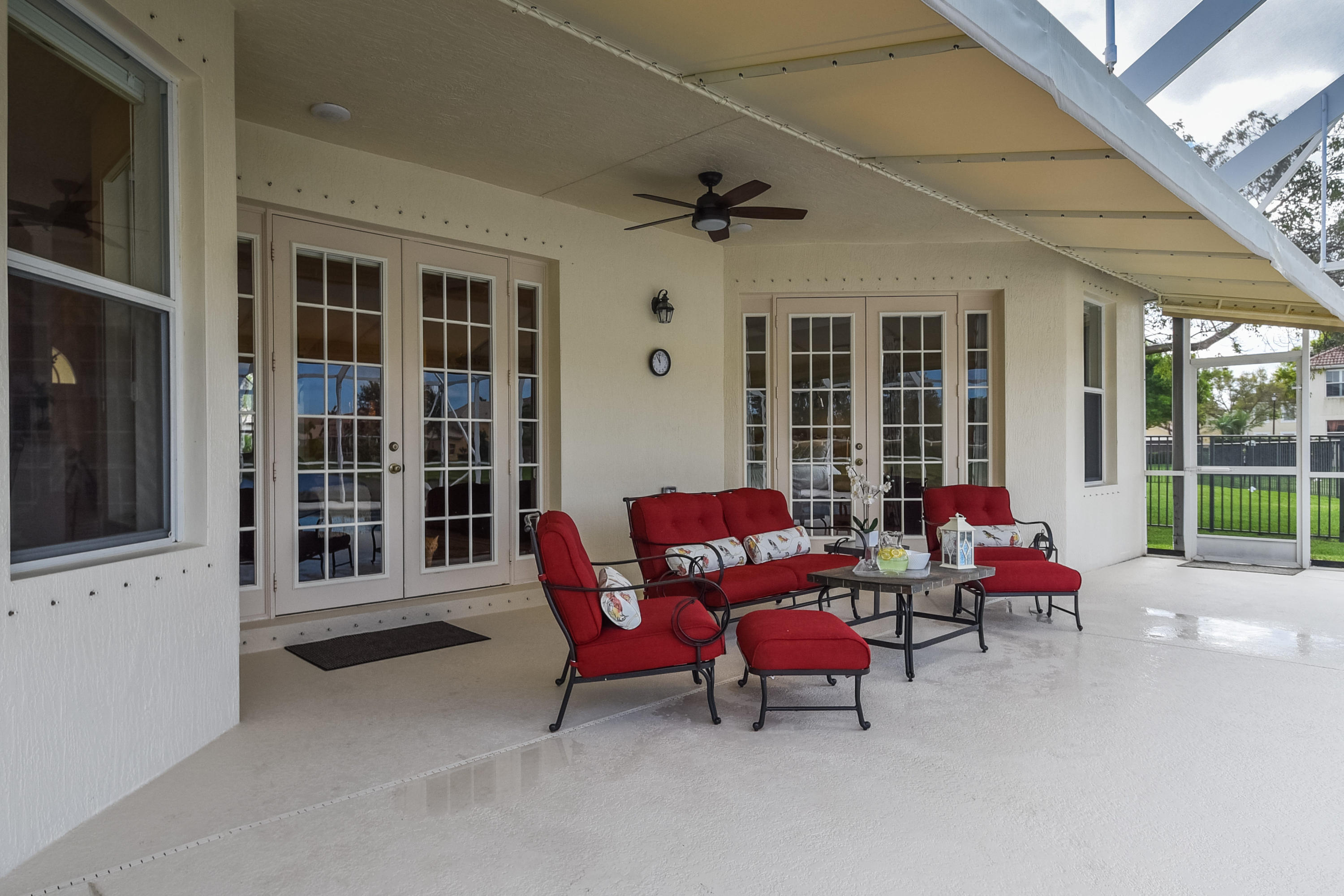 7209 Serrano Terrace Delray Beach, FL 33446 - Photo 40 of 46 French Doors Open to Patio