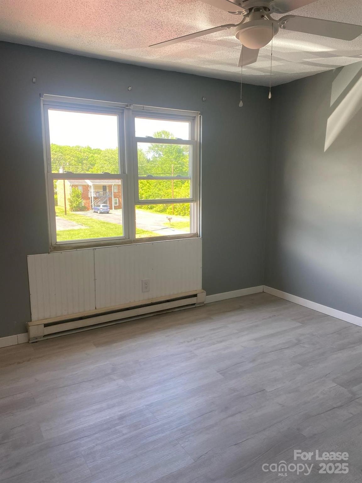 1966 Lakeview Road, Unit 12 Asheboro, NC 27203 - Photo 1 of 14 an empty room with a window