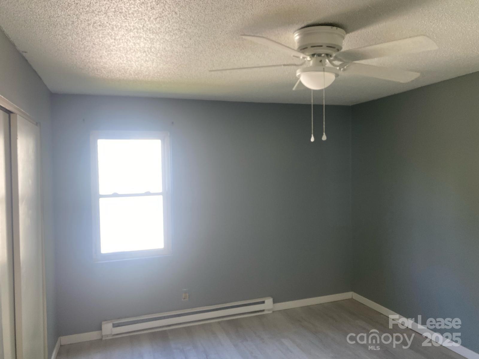 1966 Lakeview Road, Unit 12 Asheboro, NC 27203 - Photo 14 of 14 an empty room with a window