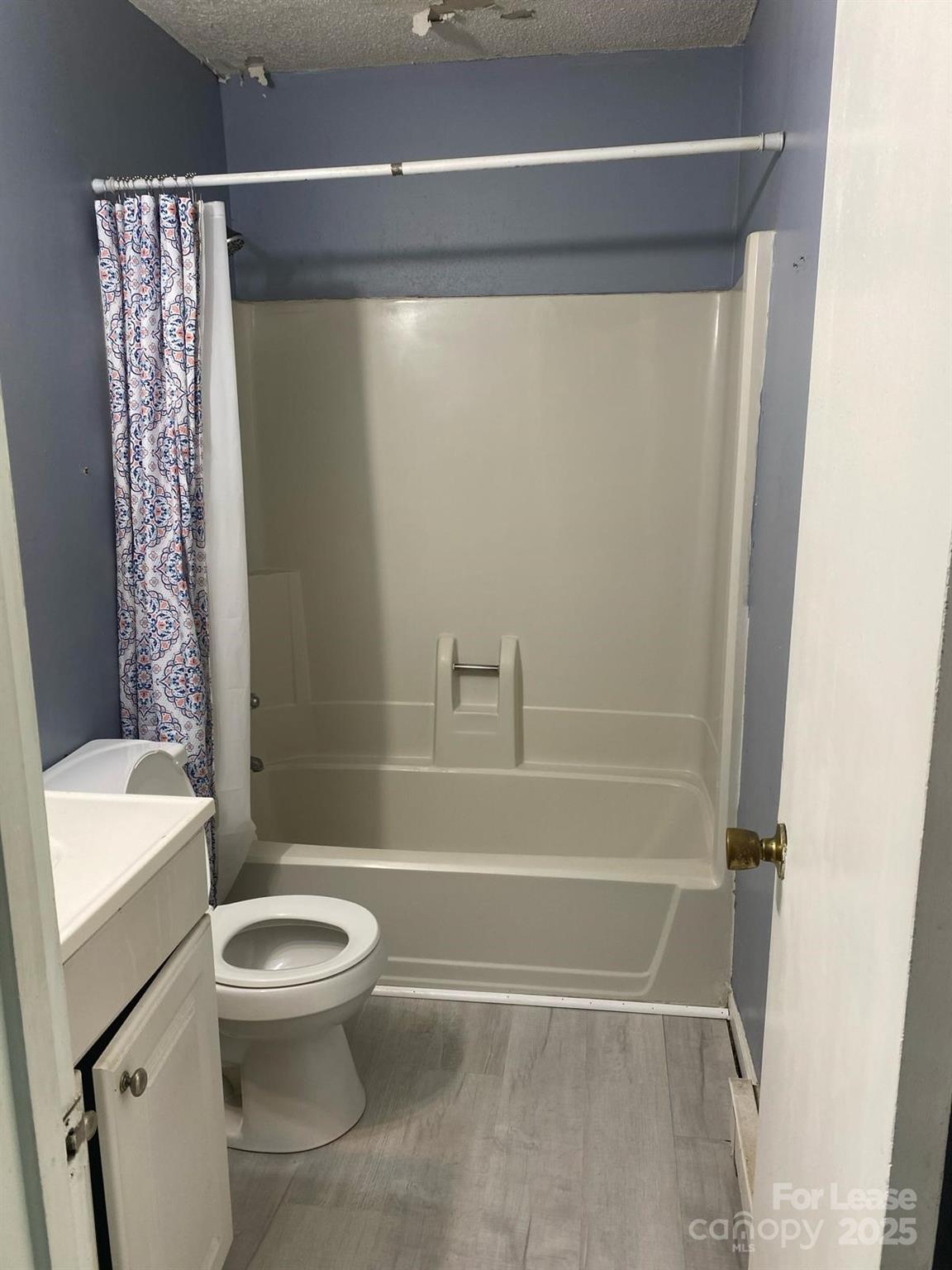 1966 Lakeview Road, Unit 12 Asheboro, NC 27203 - Photo 10 of 14 a bathroom with a toilet and a shower
