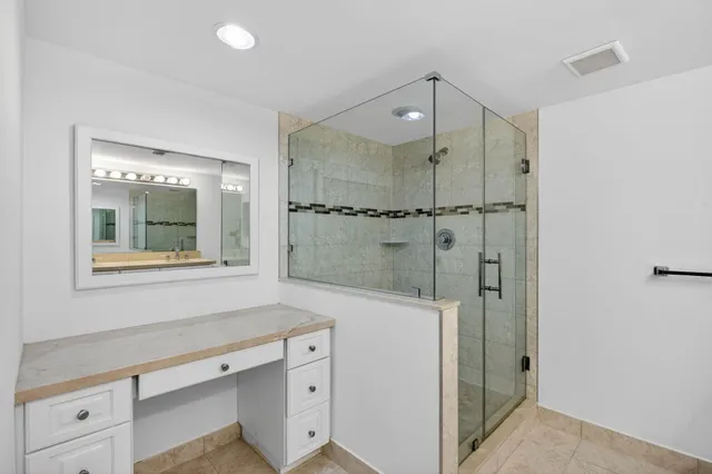 an empty room with sliding door and mountain view