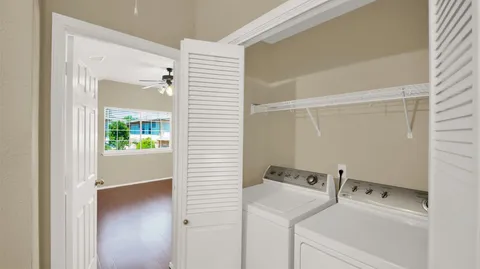 a view of utility room with washer and dryer