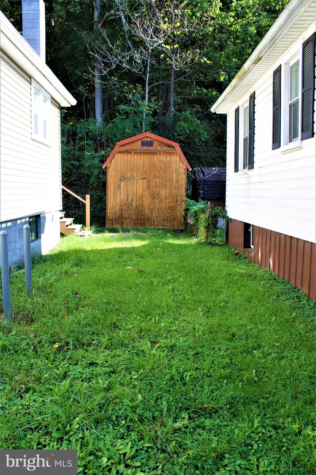 14400 Winchester Road Southwest Cresaptown, MD 21502 - Photo 4 of 29 Side Yard & Shed View