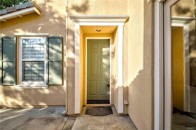a view of a glass door of the house