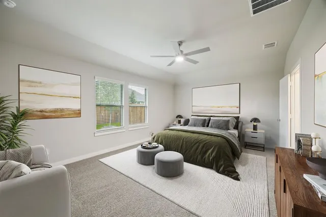 a bedroom with furniture and a window