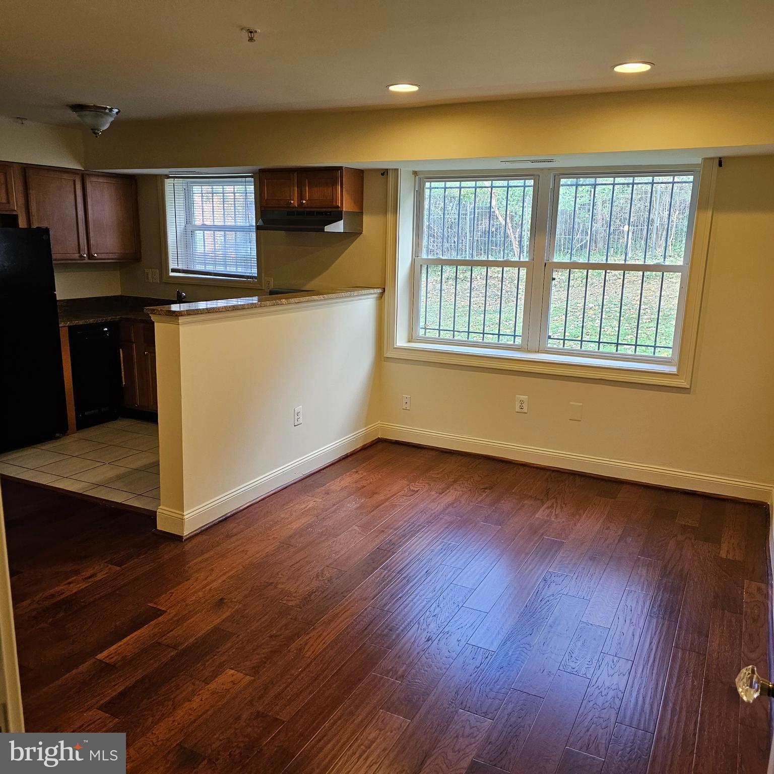4800 C Street Southeast, Unit 102 Washington, DC 20019 - Photo 3 of 14 a view of kitchen and wooden floor