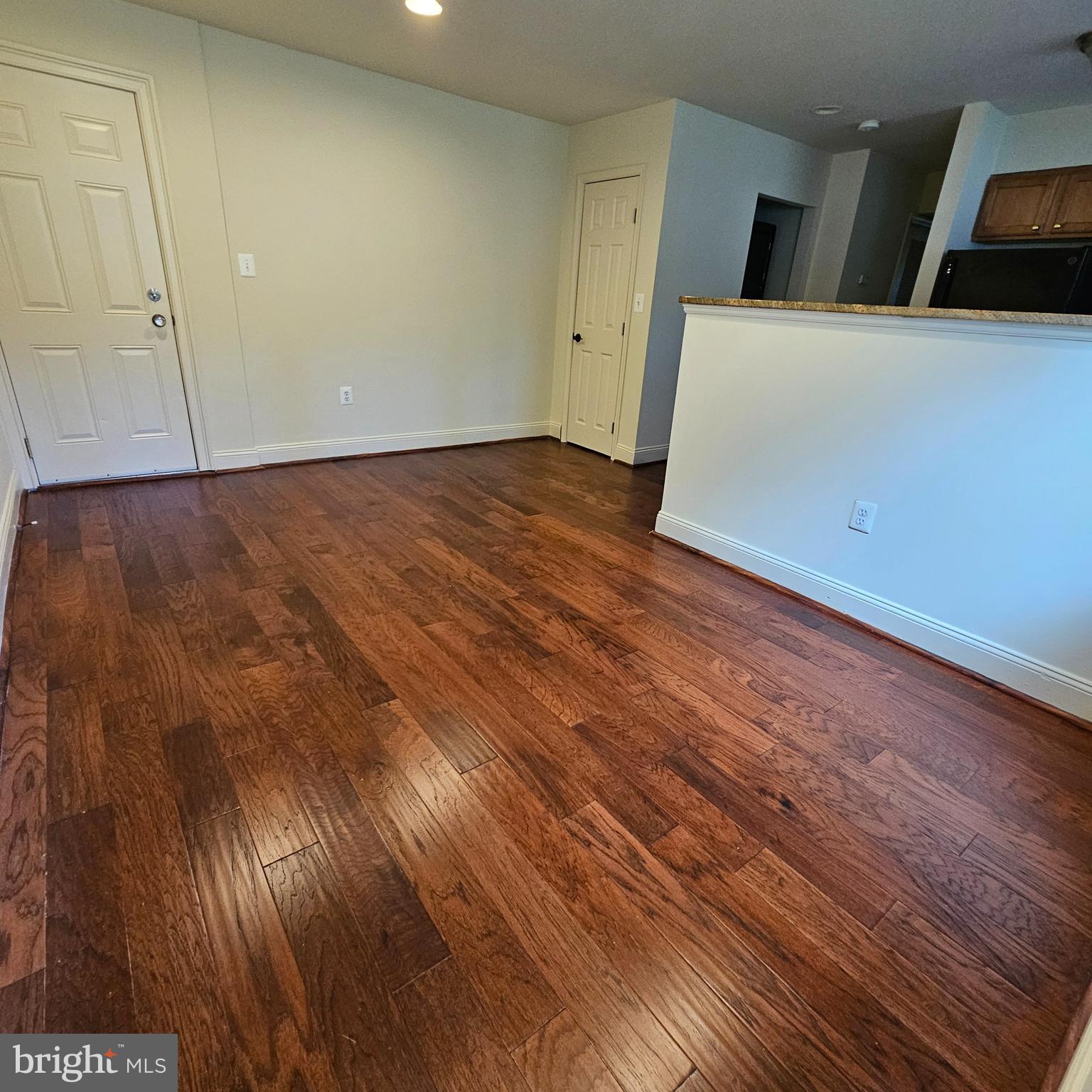 4800 C Street Southeast, Unit 102 Washington, DC 20019 - Photo 6 of 14 a view of room with wooden floor