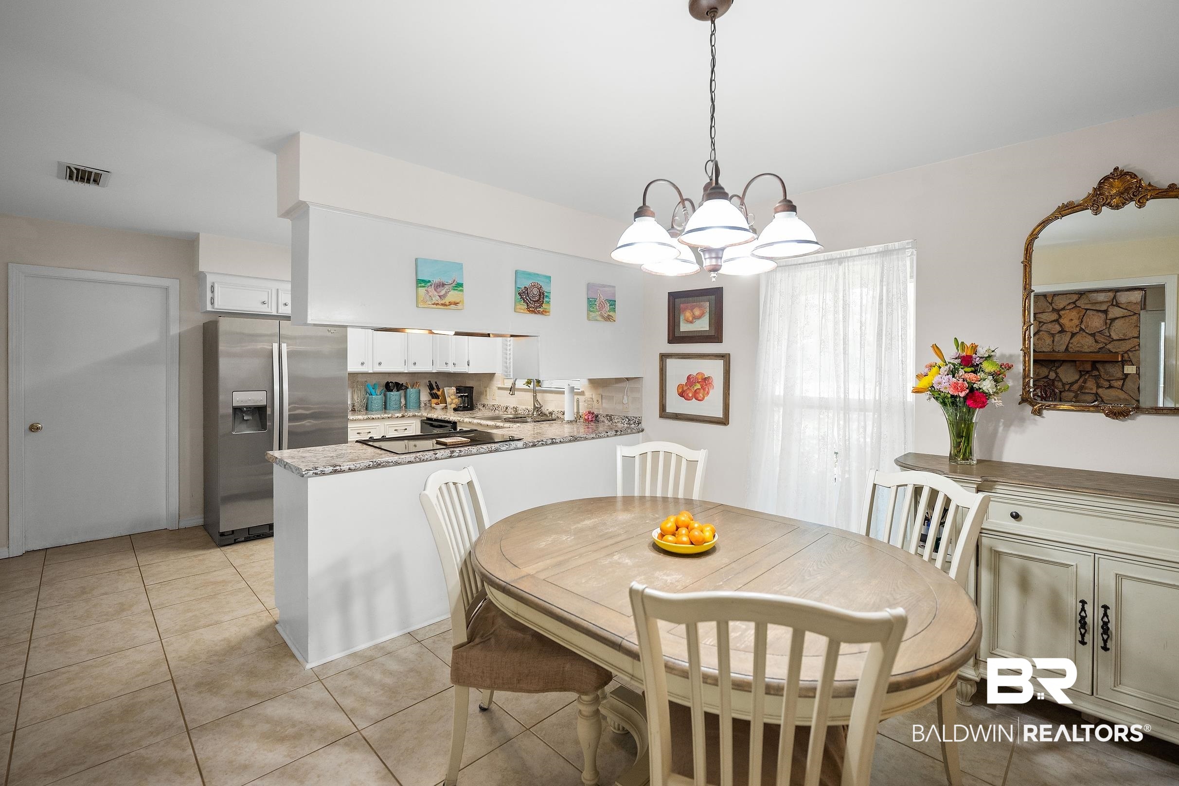 120 Dunbar Loop Daphne, AL 36526 - Photo 6 of 25 Dining room featuring suspended lighting and light tile patterned floors