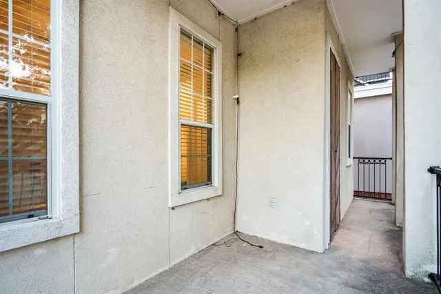 a view of a room that has a window in it