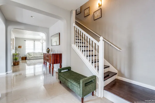 a view of livingroom and dining room with wooden floor