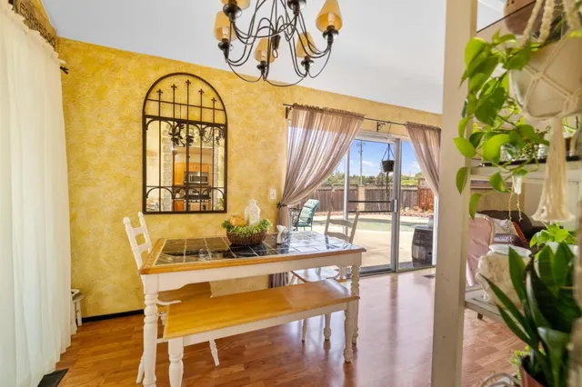 a view of hall way with furniture