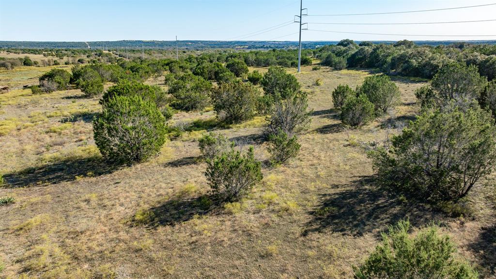 Lot 6 Bluff View Trail Gustine, TX 76455 - Photo 19 of 21 a view of a lake with a mountain