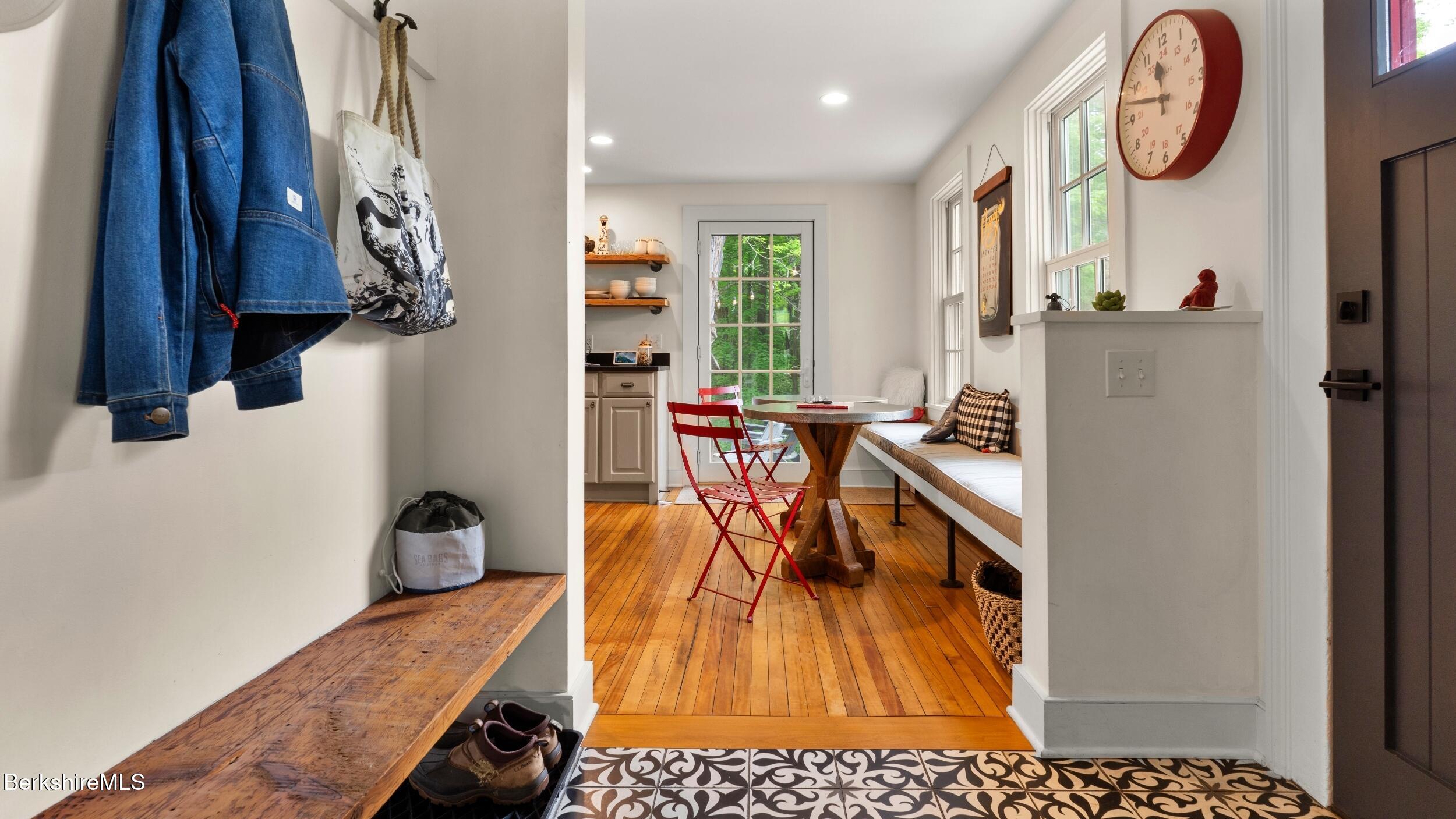 8 Yale Hill Road Stockbridge, MA 01262 - Photo 14 of 51 a living room with furniture a large window with table and chairs