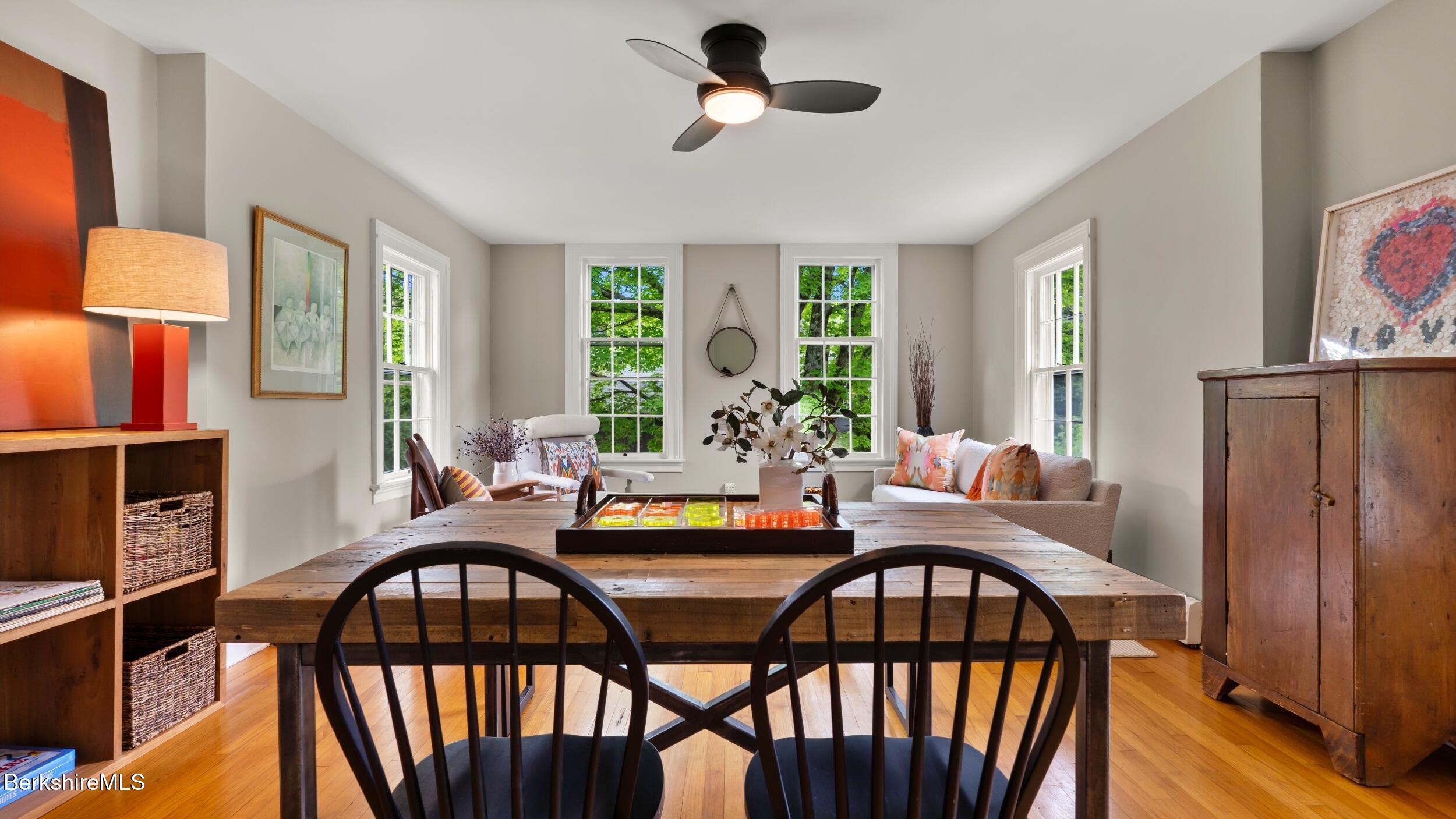 8 Yale Hill Road Stockbridge, MA 01262 - Photo 15 of 51 a dining room with furniture a chandelier and wooden floor