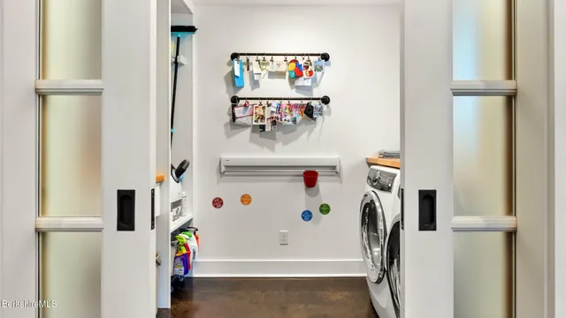 a bathroom with a bathtub and a window