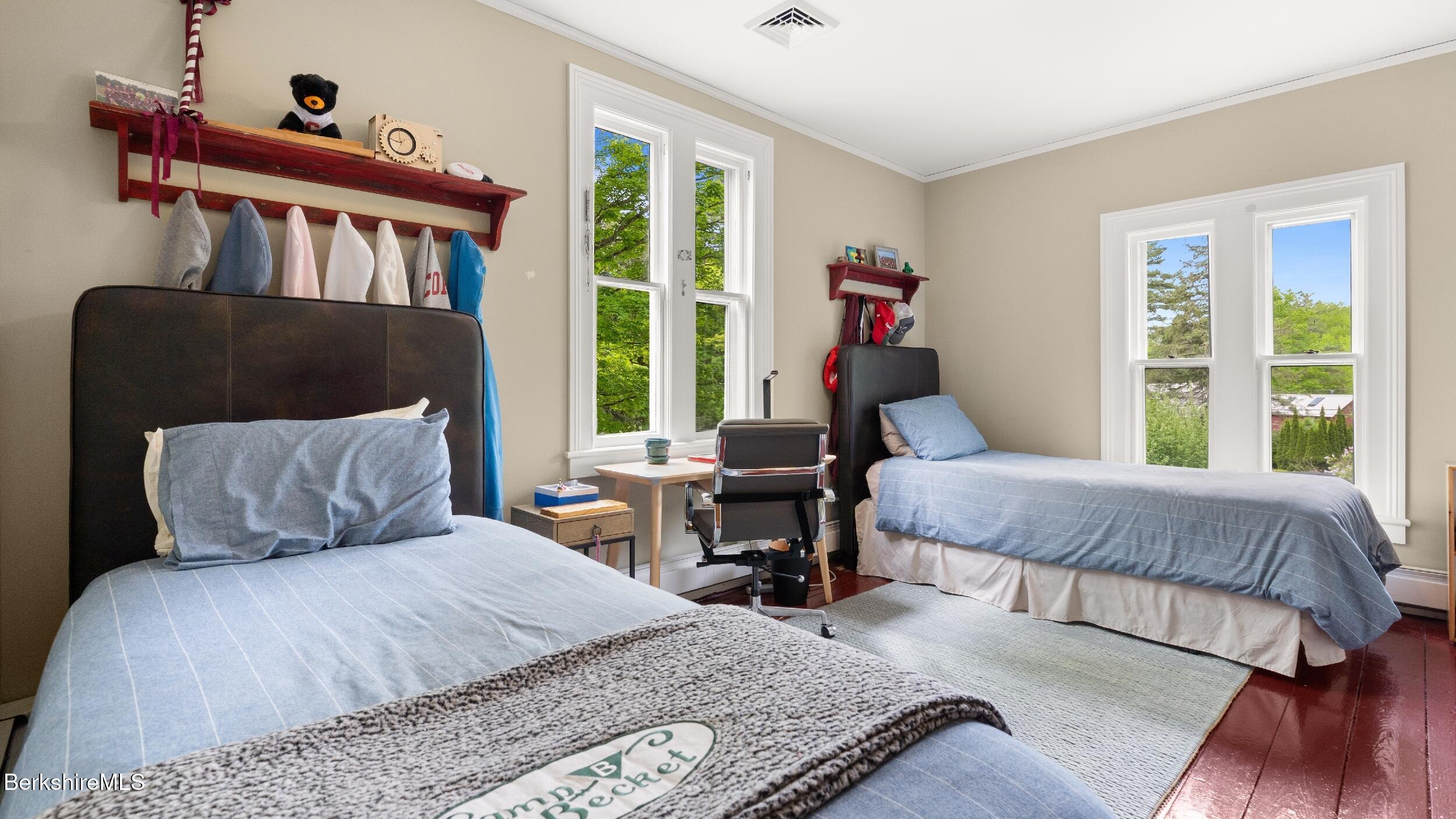 8 Yale Hill Road Stockbridge, MA 01262 - Photo 35 of 51 a bedroom with a bed a large window and a potted plant