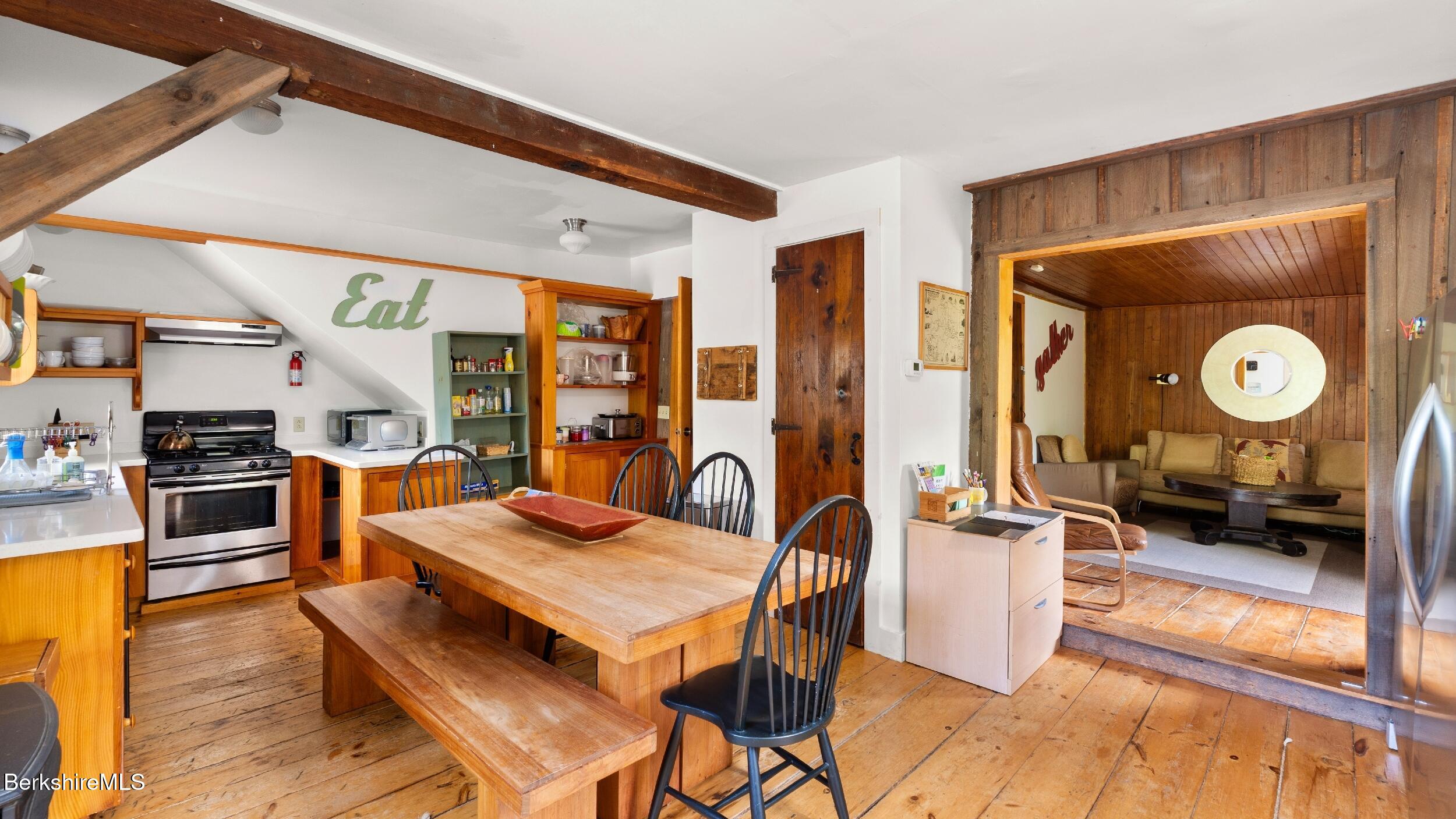 8 Yale Hill Road Stockbridge, MA 01262 - Photo 49 of 51 a living room with furniture a flat screen tv and a large window
