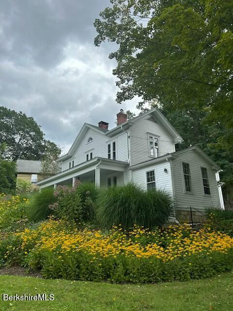 8 Yale Hill Road Stockbridge, MA 01262 - Photo 51 of 51 a front view of a house with a yard