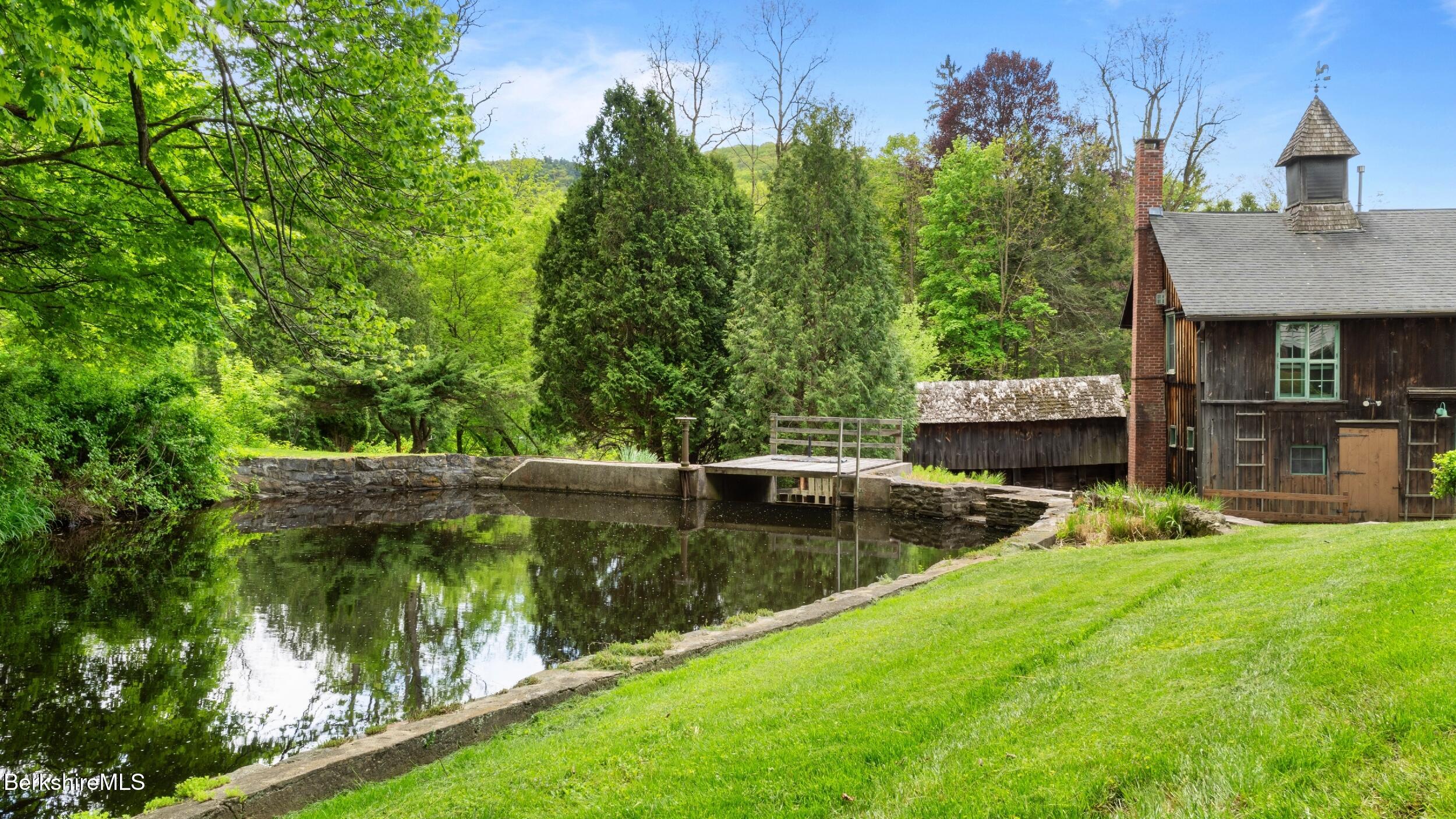 8 Yale Hill Road Stockbridge, MA 01262 - Photo 7 of 51 a view of a swimming pool with a patio