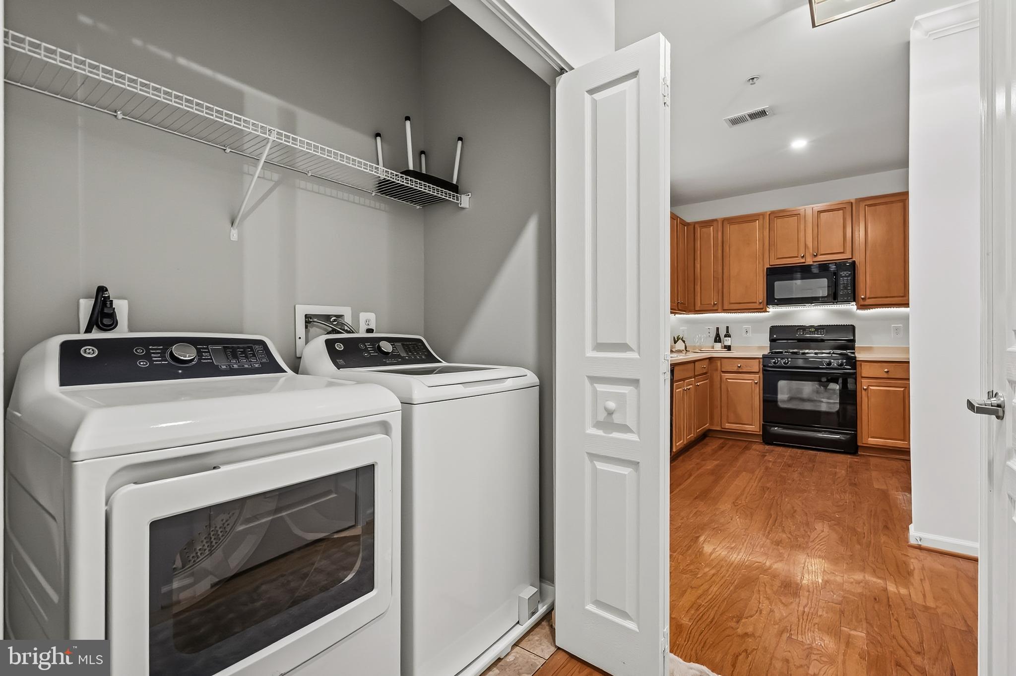 12001 Market Street, Unit 266 Reston, VA 20190 - Photo 18 of 24 LAUNDRY AREA