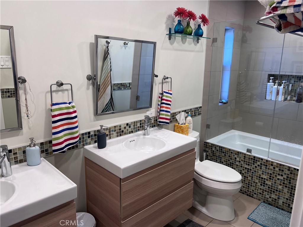 16 Seton Road Irvine, CA 92612 - Photo 24 of 31 a bathroom with a sink toilet and shower