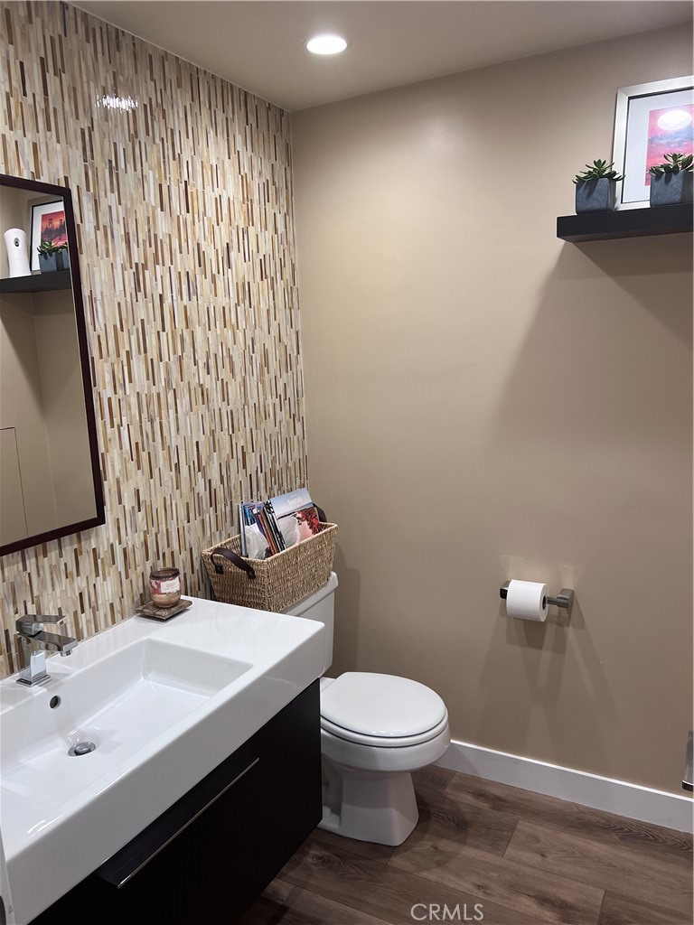 16 Seton Road Irvine, CA 92612 - Photo 27 of 31 a bathroom with a sink a toilet and mirror