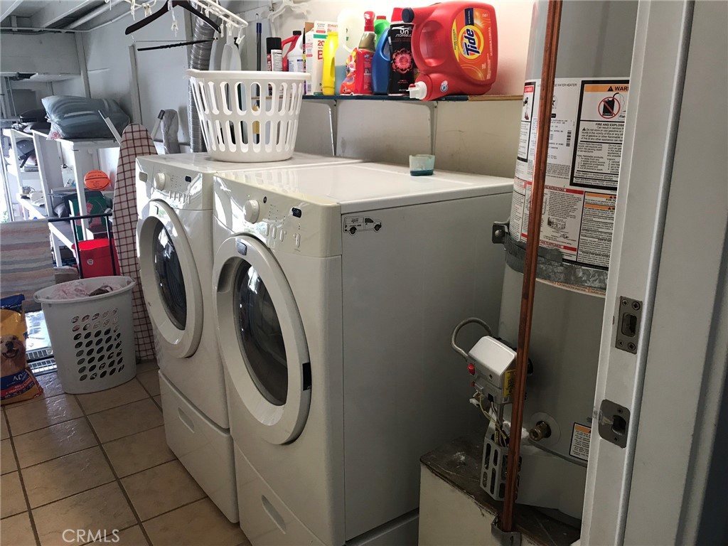 16 Seton Road Irvine, CA 92612 - Photo 31 of 31 a utility room with dryer and washer