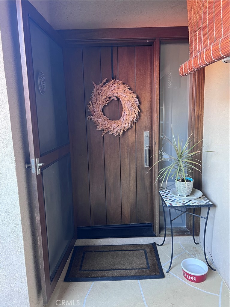 16 Seton Road Irvine, CA 92612 - Photo 8 of 31 a view of entryway with furniture and a potted plant