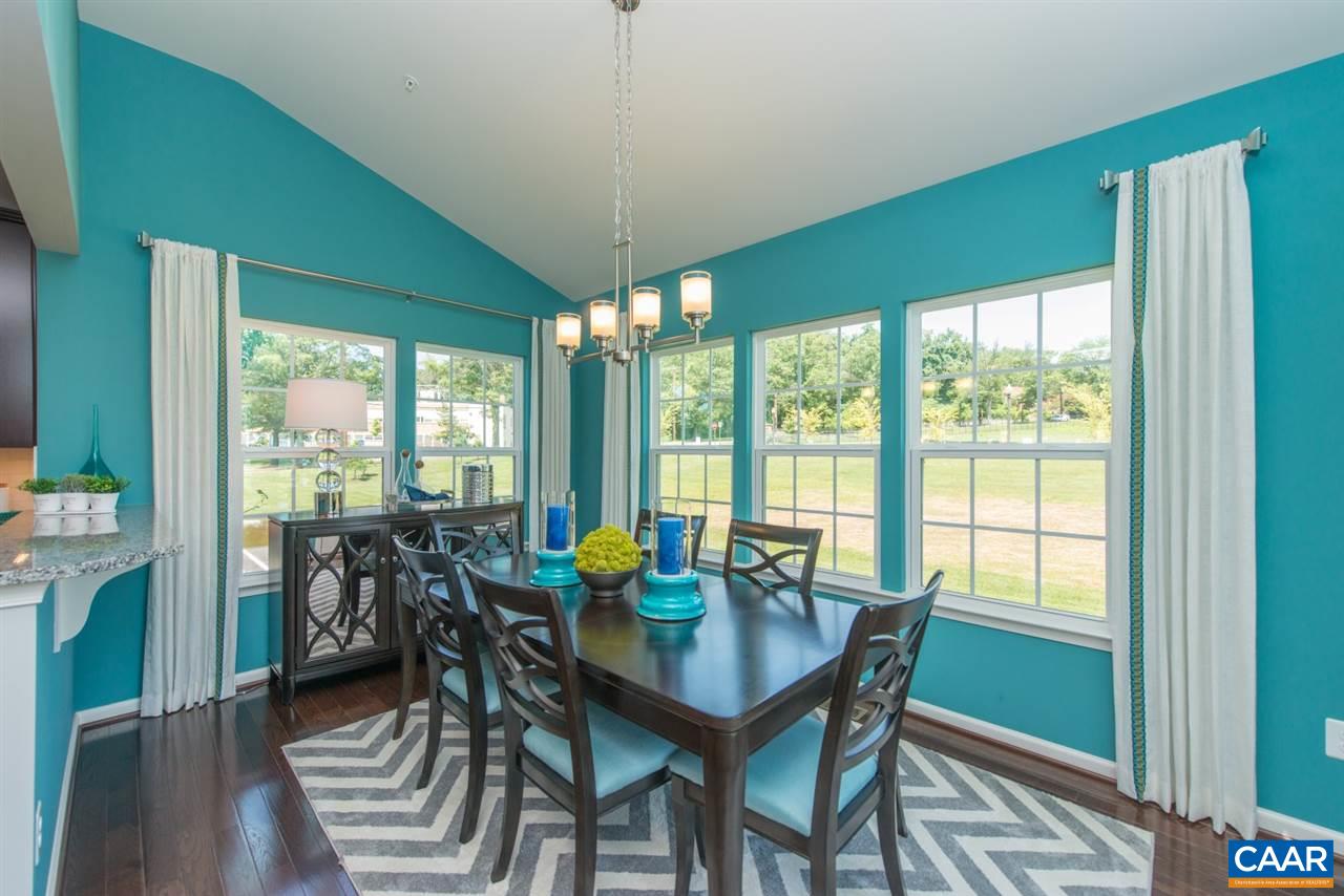68 Ridgemont Road Ruckersville, VA 22968 - Photo 6 of 20 a view of a dining room with furniture window and outside view
