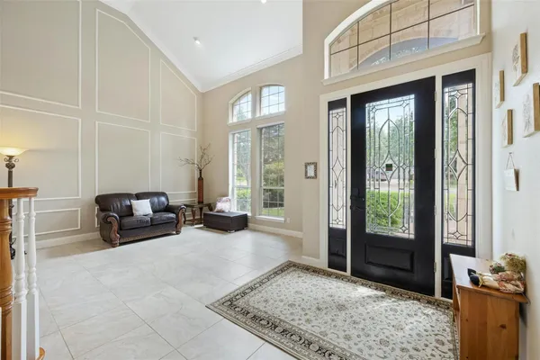 a view of a livingroom with furniture and a rug