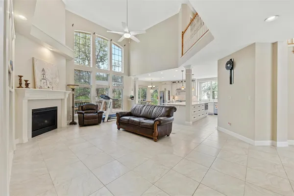 a bedroom with a bed and a fireplace