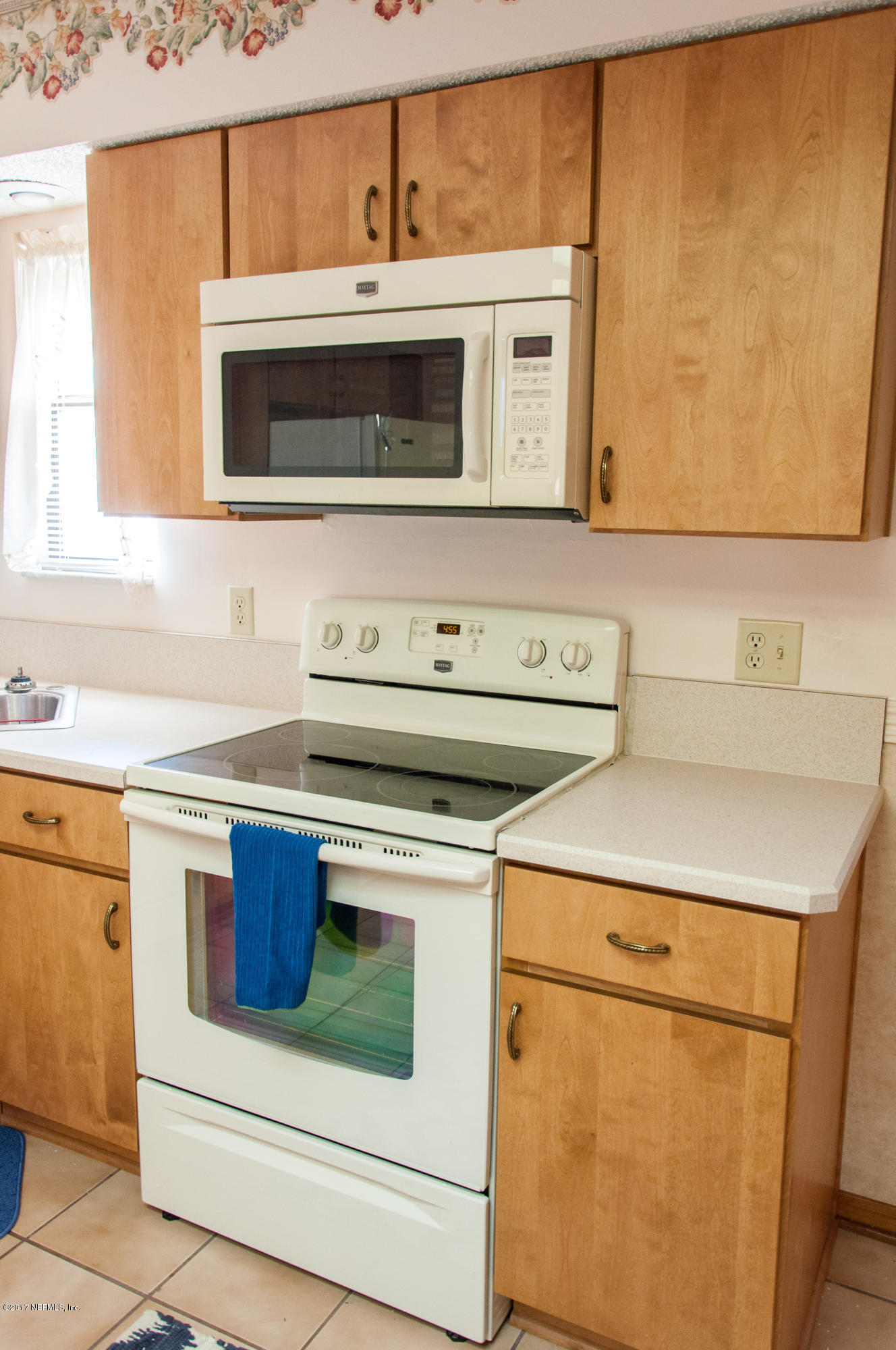 5461 Spring Brook Road Jacksonville, FL 32277 - Photo 15 of 38 a utility room with dryer and washer