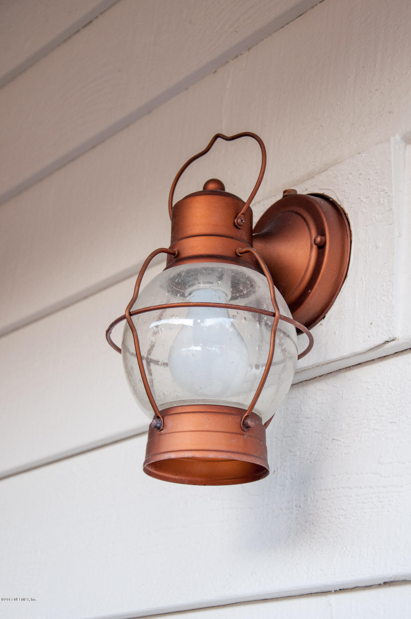 5461 Spring Brook Road Jacksonville, FL 32277 - Photo 5 of 38 a water heater on the top of a shelf