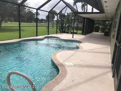 a view of a house with a yard porch and sitting area