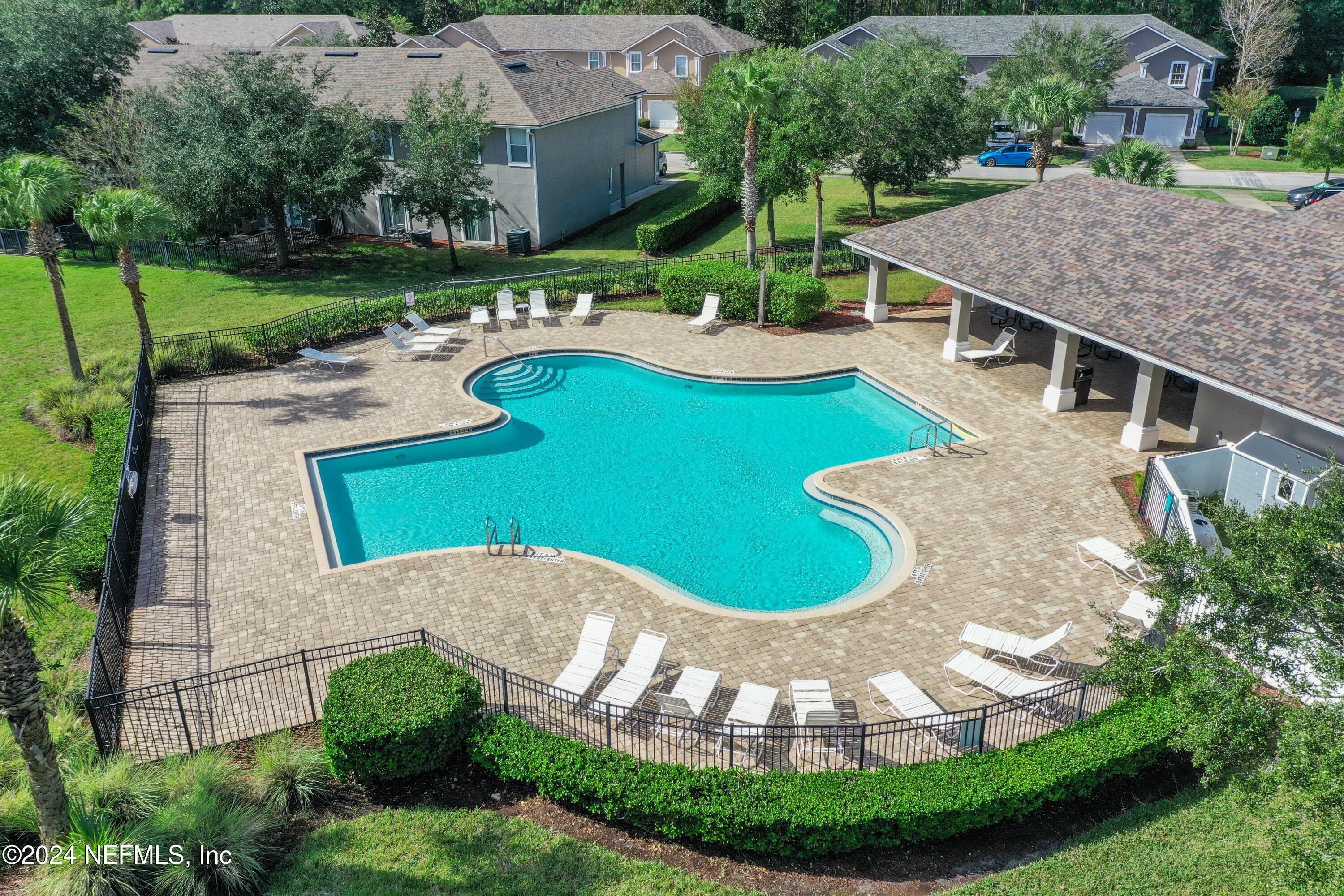 513 Scrub Jay Drive St. Augustine, FL 32092 - Photo 22 of 25 an aerial view of a house with yard swimming pool and outdoor seating