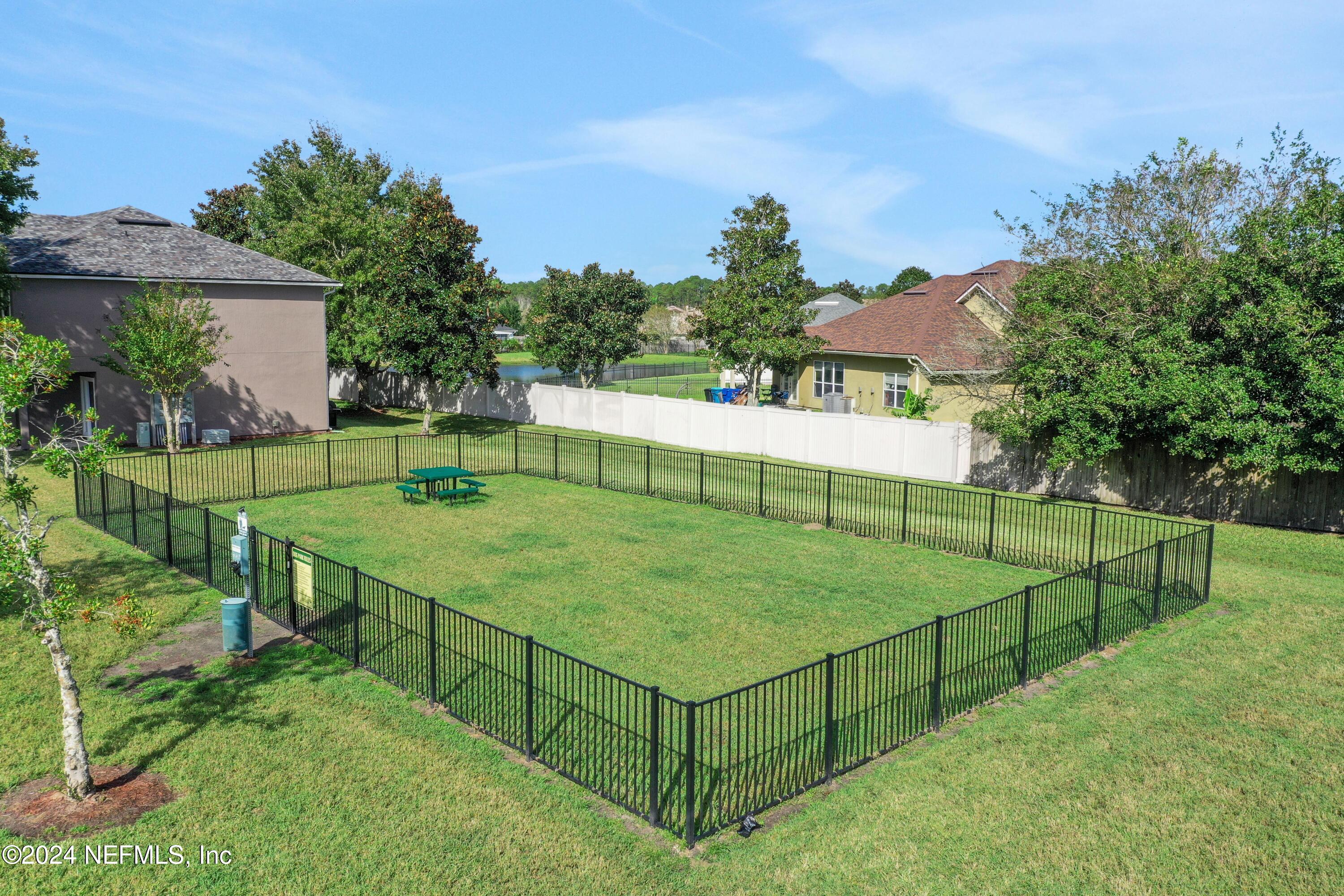 513 Scrub Jay Drive St. Augustine, FL 32092 - Photo 24 of 25 a view of a backyard