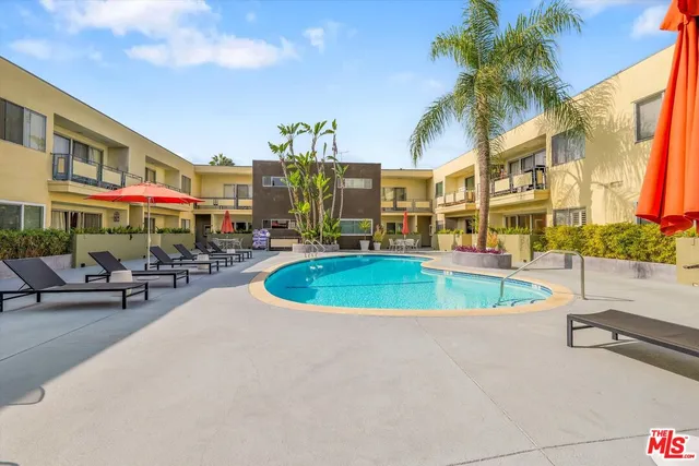 a view of a room with potted plants