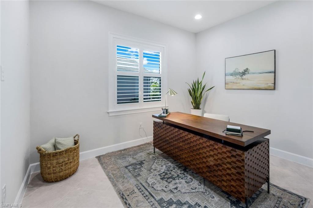 8850 Calypso Court Naples, FL 34113 - Photo 24 of 41 Home office with recessed lighting and light tile patterned floors