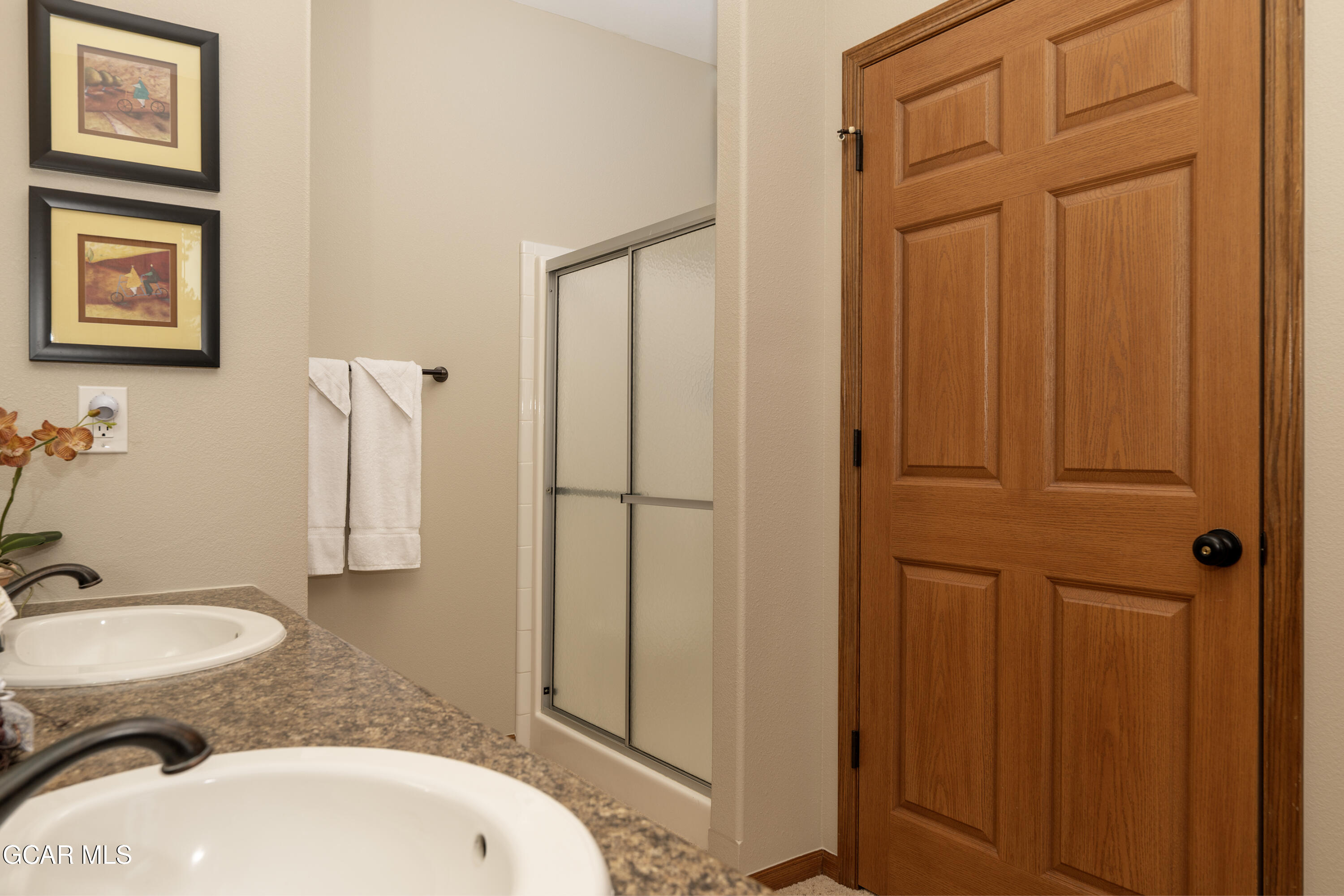 840 Ferret Lane Fraser, CO 80442 - Photo 12 of 33 a bathroom with a sink a toilet and shower curtain