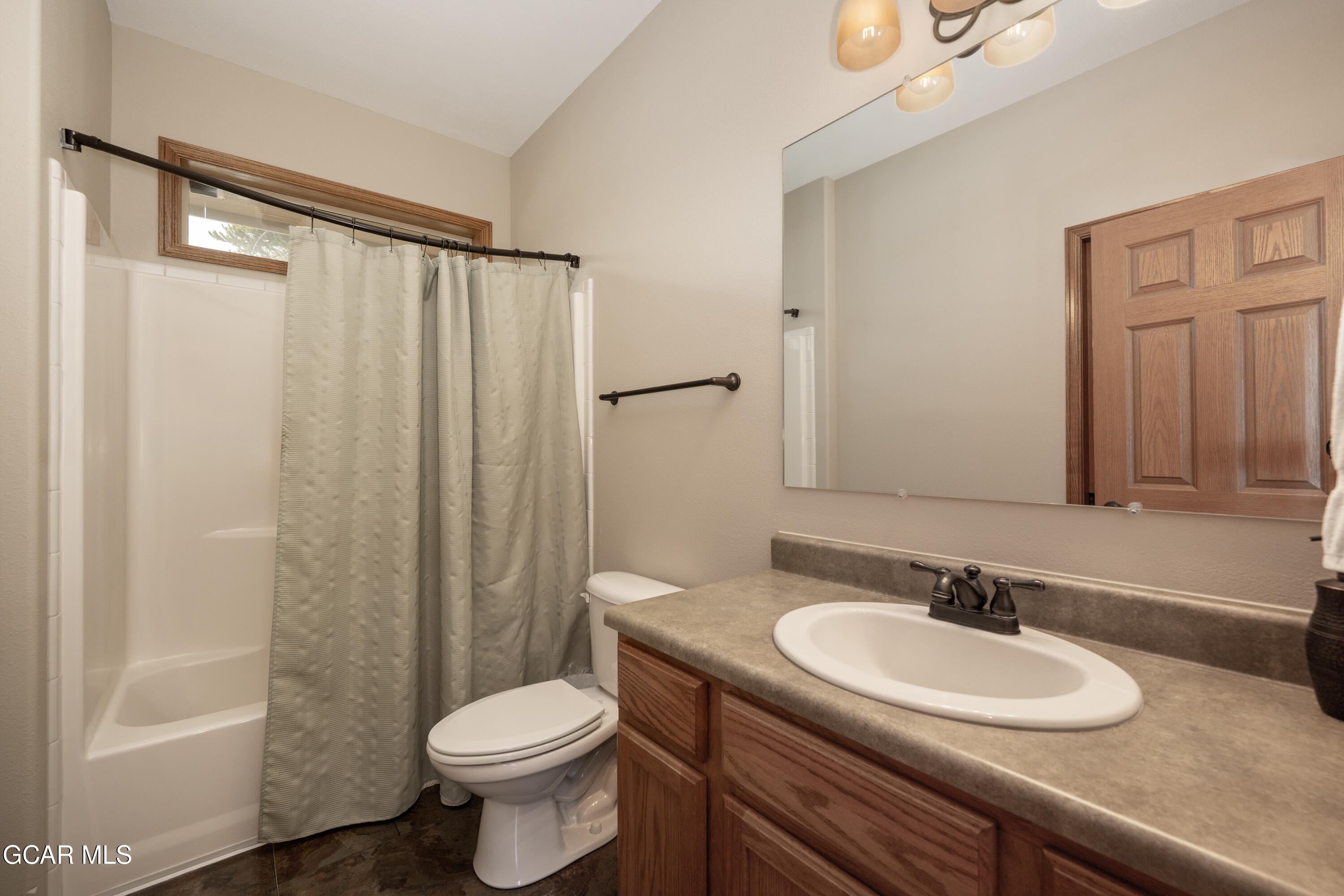 840 Ferret Lane Fraser, CO 80442 - Photo 16 of 33 a bathroom with a sink a toilet and a mirror