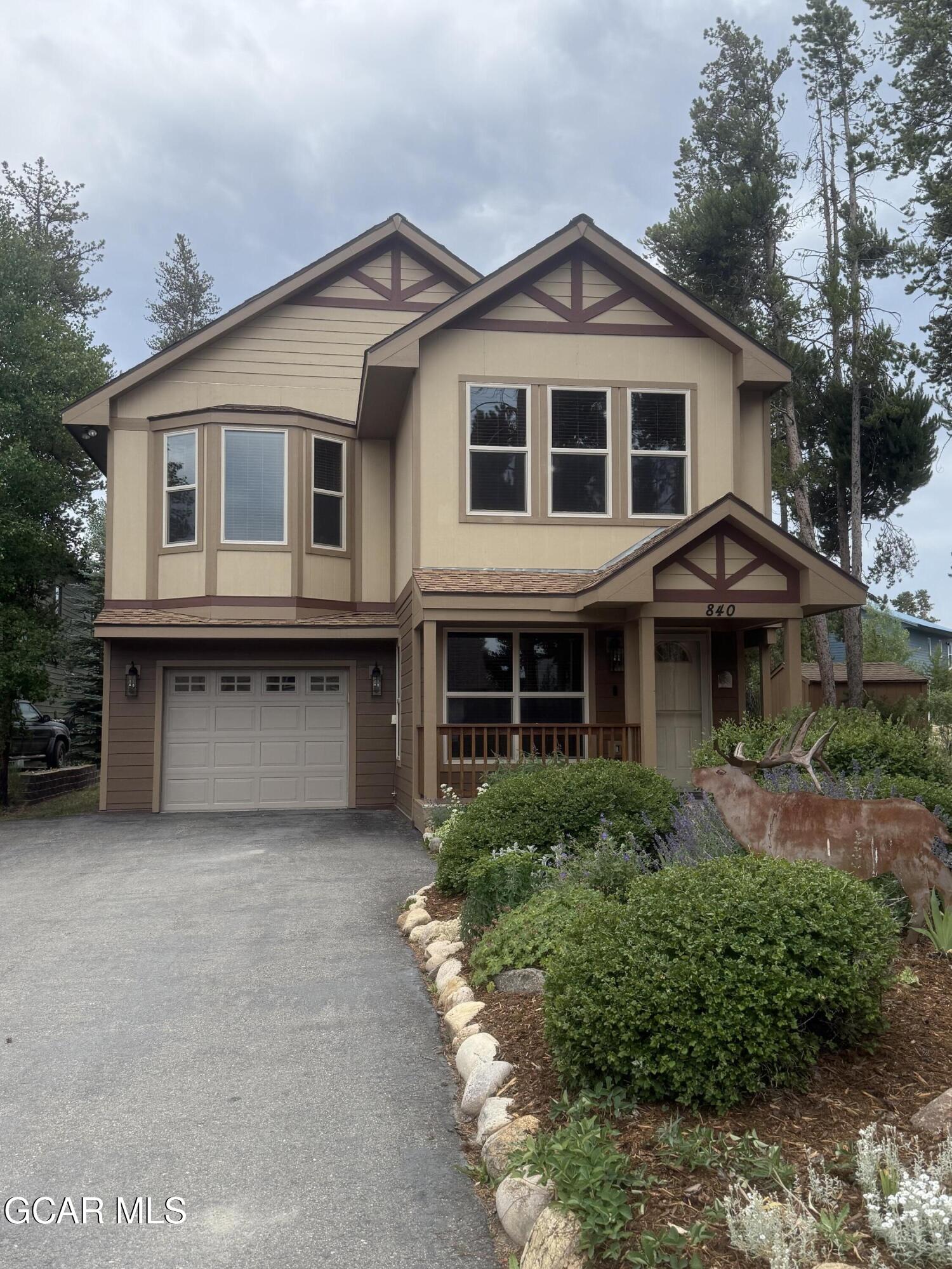 840 Ferret Lane Fraser, CO 80442 - Photo 30 of 33 a front view of a house with a garden
