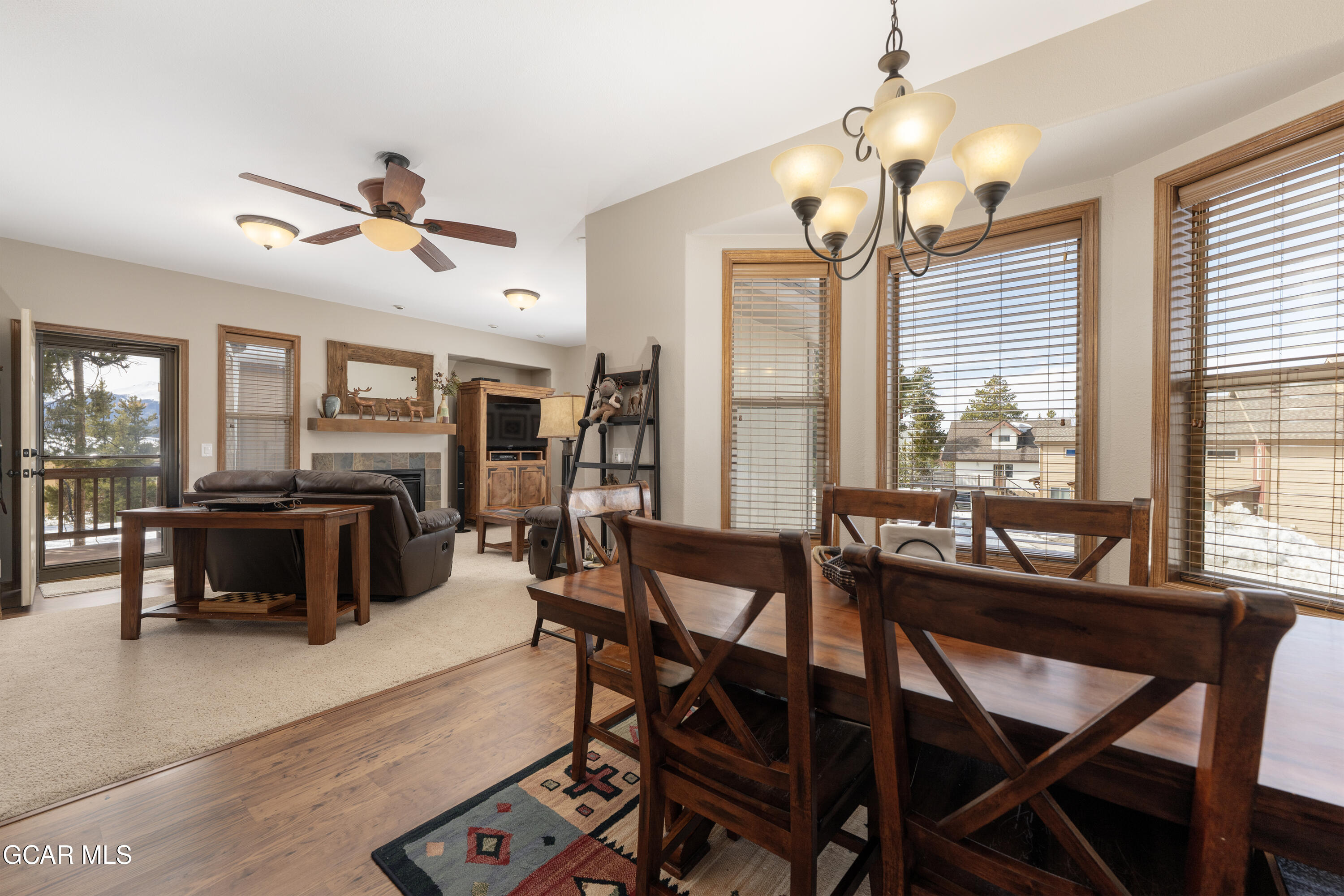 840 Ferret Lane Fraser, CO 80442 - Photo 8 of 33 a dining room with furniture a chandelier and window