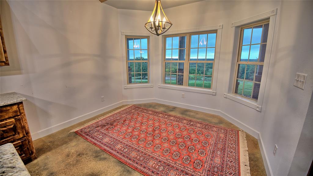 2930 North Greenbrier Road Nocona, TX 76255 - Photo 11 of 40 a view of an empty room with a window