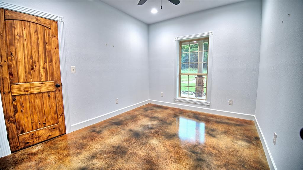 2930 North Greenbrier Road Nocona, TX 76255 - Photo 20 of 40 an empty room with window