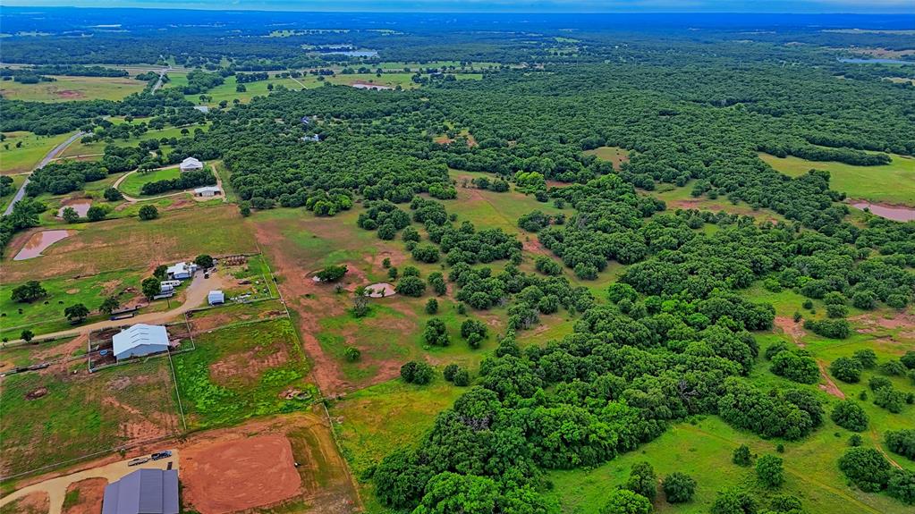2930 North Greenbrier Road Nocona, TX 76255 - Photo 27 of 40 an aerial view of residential houses with outdoor space and trees