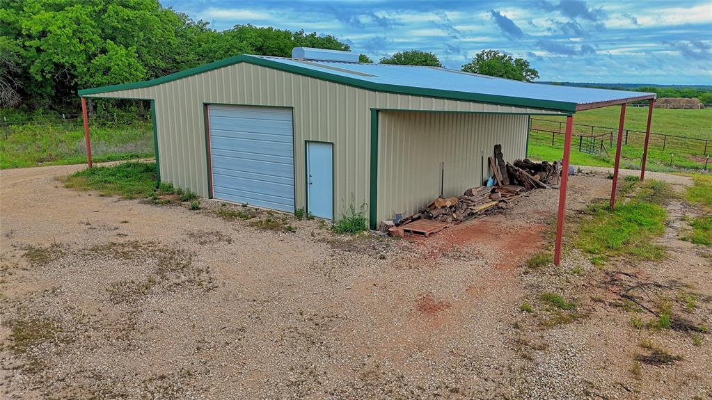 2930 North Greenbrier Road Nocona, TX 76255 - Photo 28 of 40 a view of a backyard