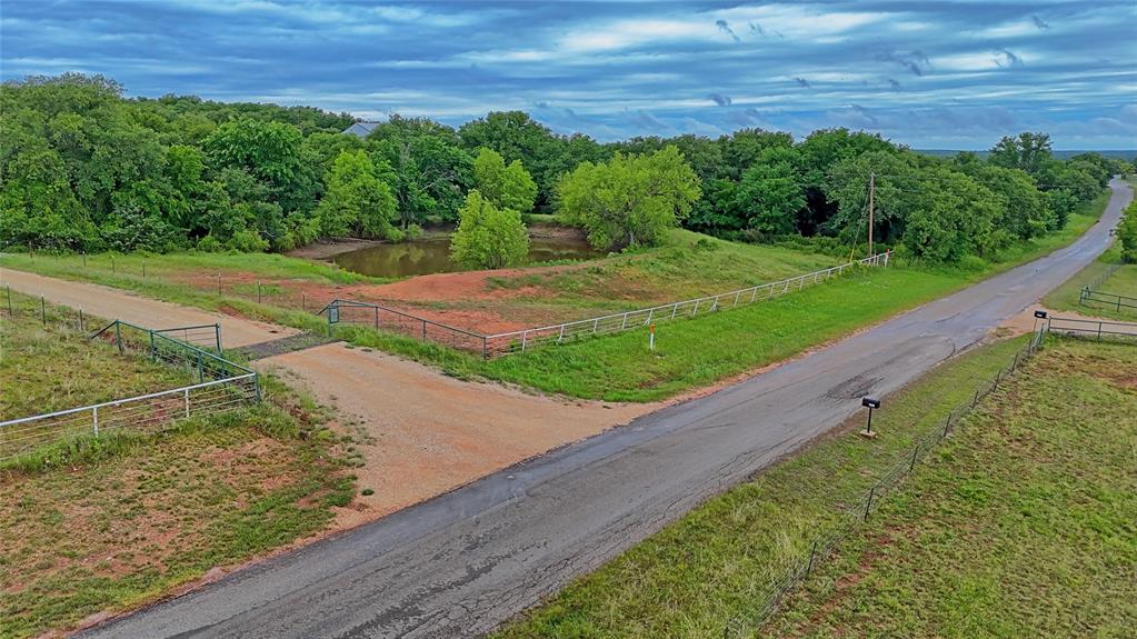 2930 North Greenbrier Road Nocona, TX 76255 - Photo 32 of 40 a view of a garden with an outdoor space