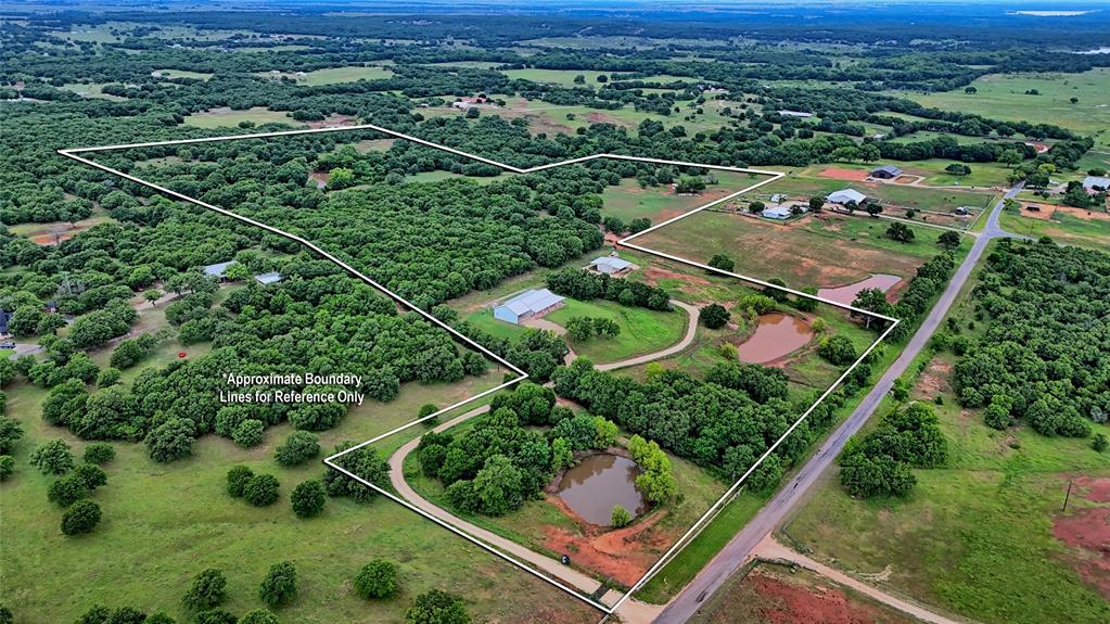 2930 North Greenbrier Road Nocona, TX 76255 - Photo 38 of 40 an aerial view of a residential houses with outdoor space and street view