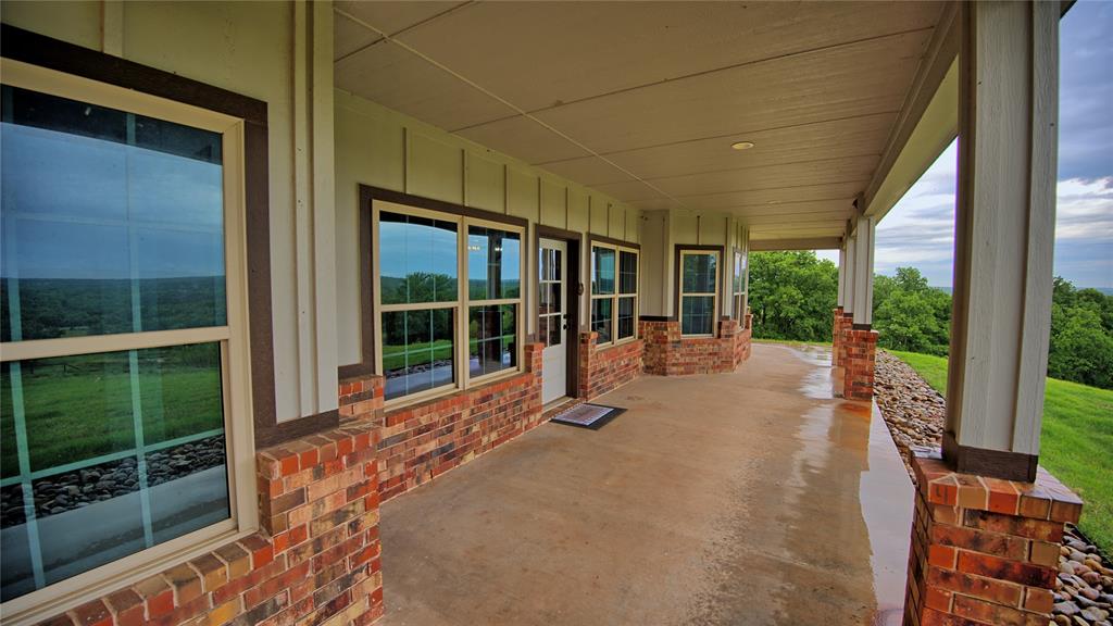 2930 North Greenbrier Road Nocona, TX 76255 - Photo 4 of 40 a view of a room with a large window